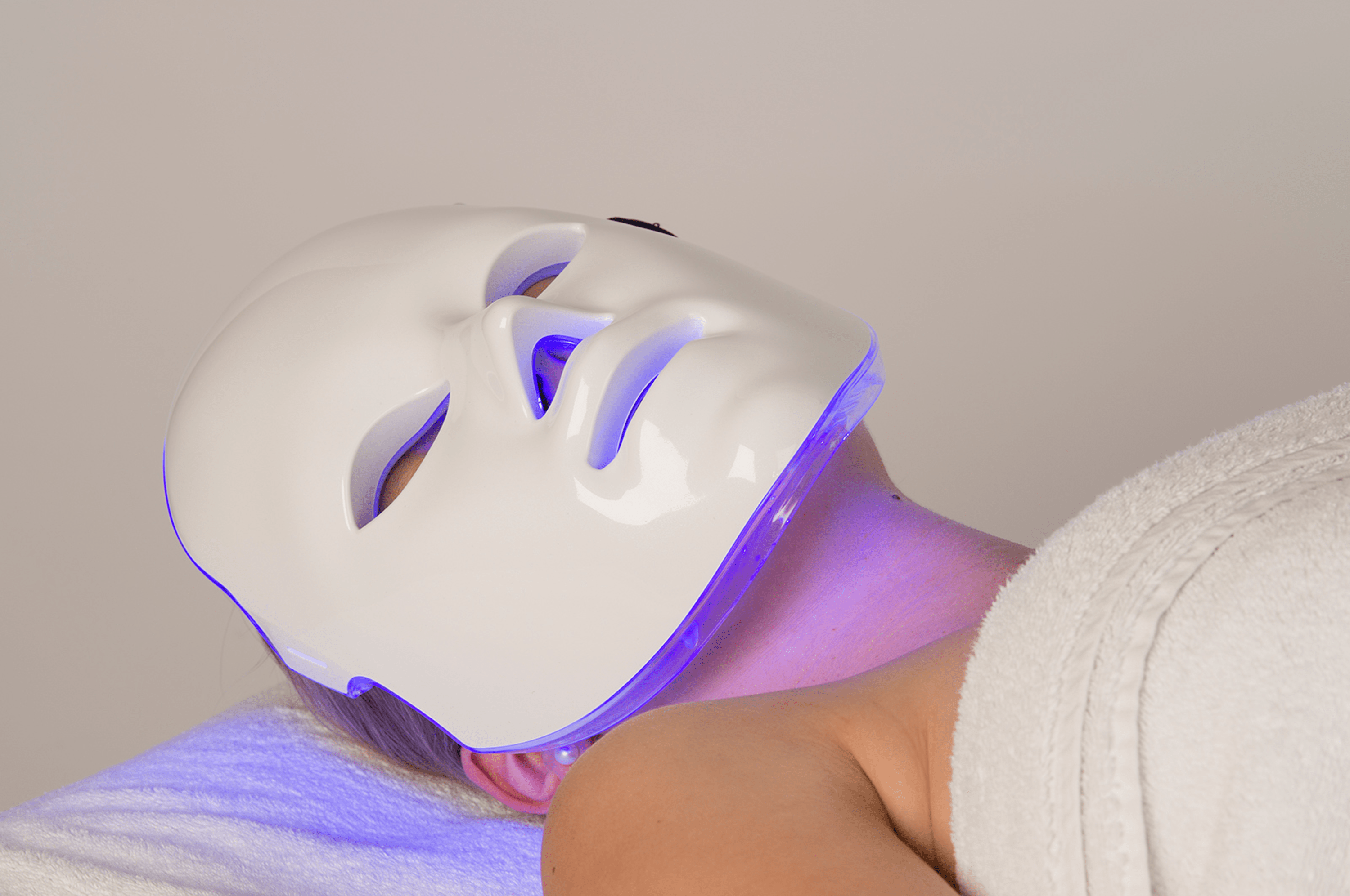 Acne photon light therapy taking place.